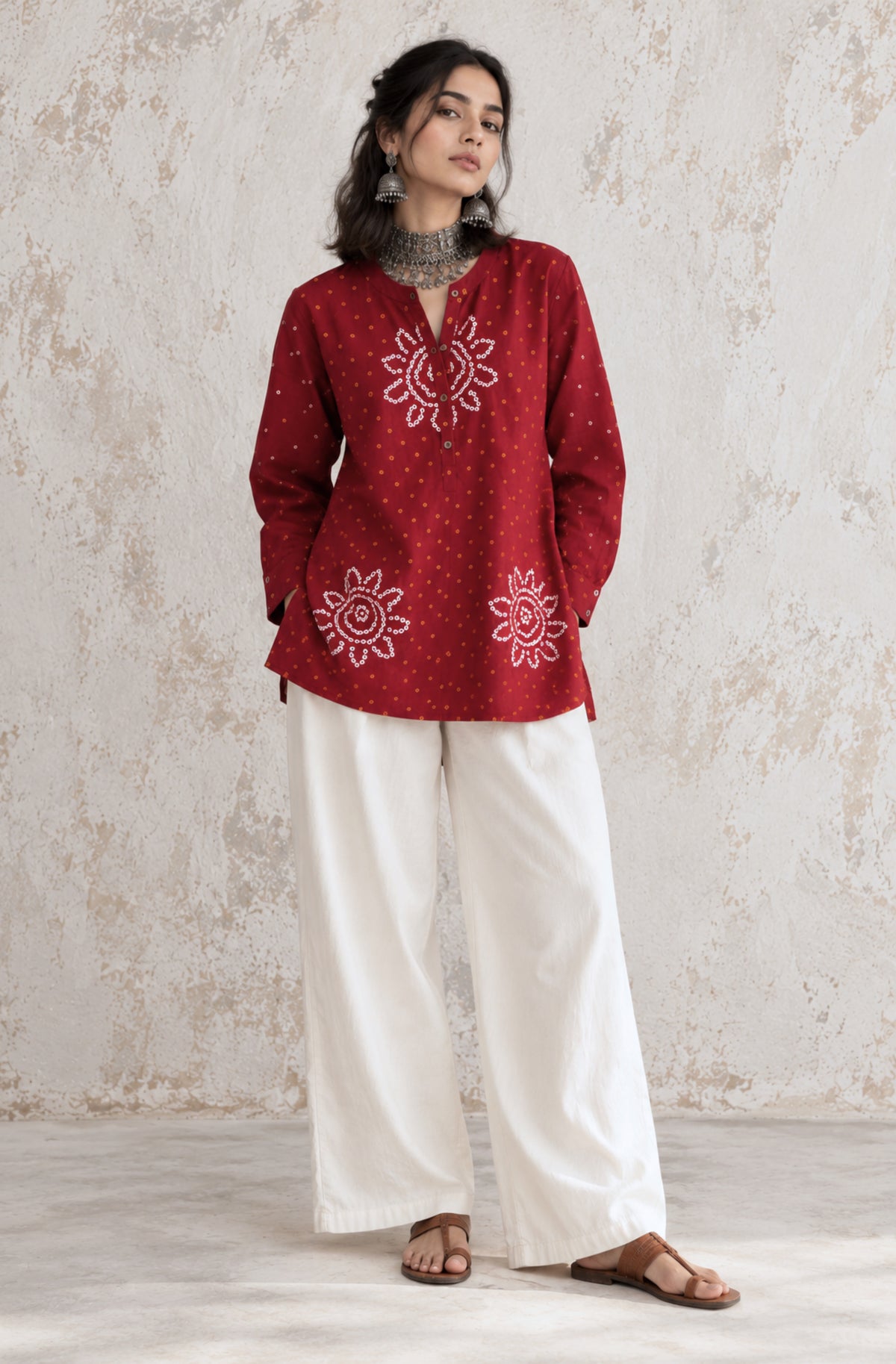 Jaswand deep red cotton shirt with turmeric-yellow and off-white hand tie-dyed Bandhani motifs, soft mandarin collar and partial button placket