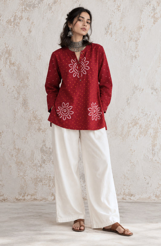 Jaswand deep red cotton shirt with turmeric-yellow and off-white hand tie-dyed Bandhani motifs, soft mandarin collar and partial button placket