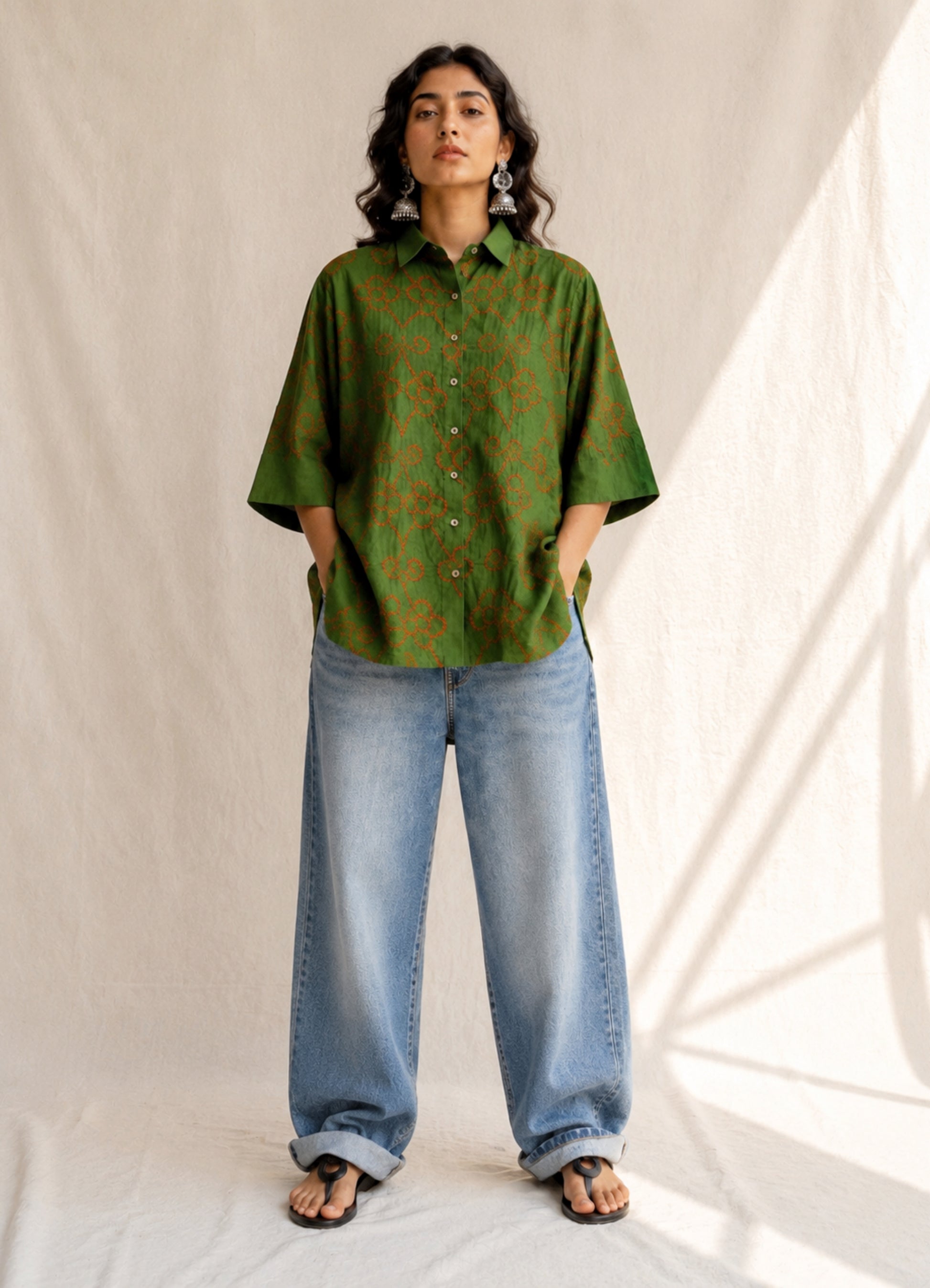 Leaf green cotton Jhankaar Bandhani shirt with deep berry pink floral vine motifs, shirt collar and relaxed relaxed fit.