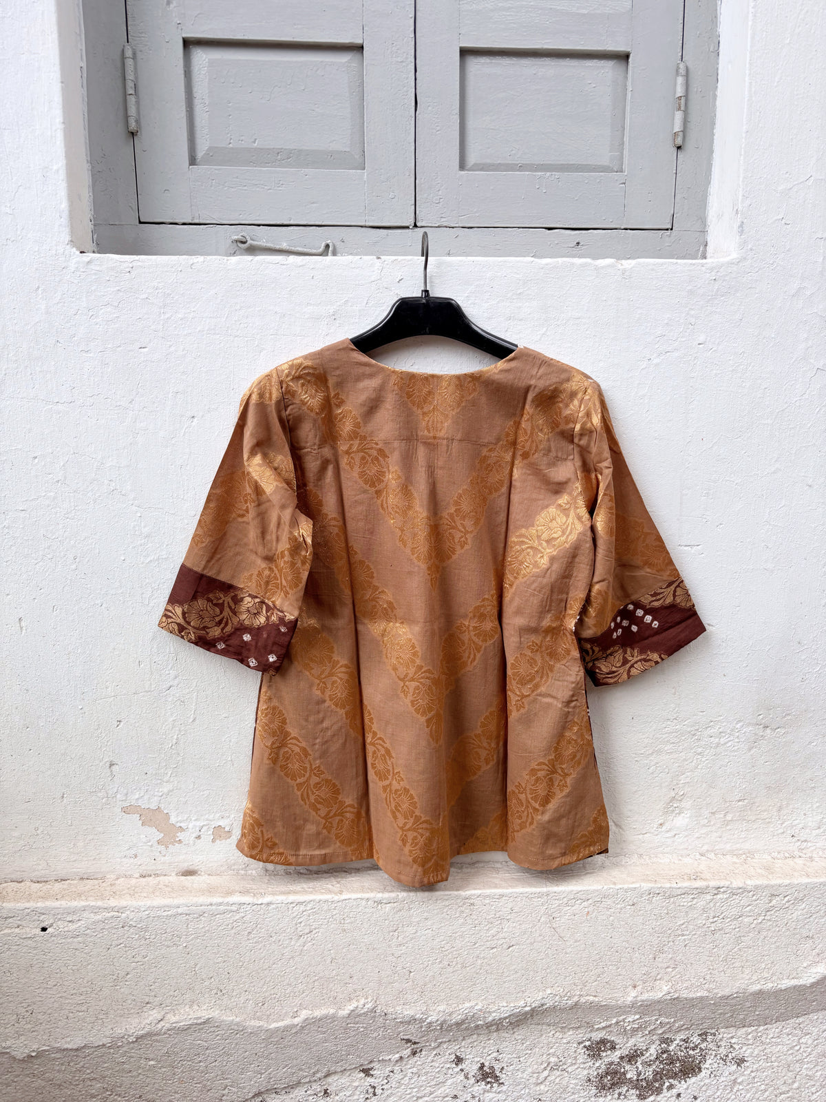 Kaashvi festive Bandhani cotton shirt in soft caramel brown and deep cocoa brown with ivory hand tie-dyed Bandhani and antique-gold self-Banarasi floral weave