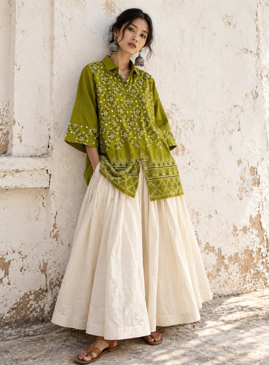 Kairi olive-lime green hand tie-dyed Bandhani cotton satin shirt with ivory Bandhani, geometric machine embroidery and embroidered hem.