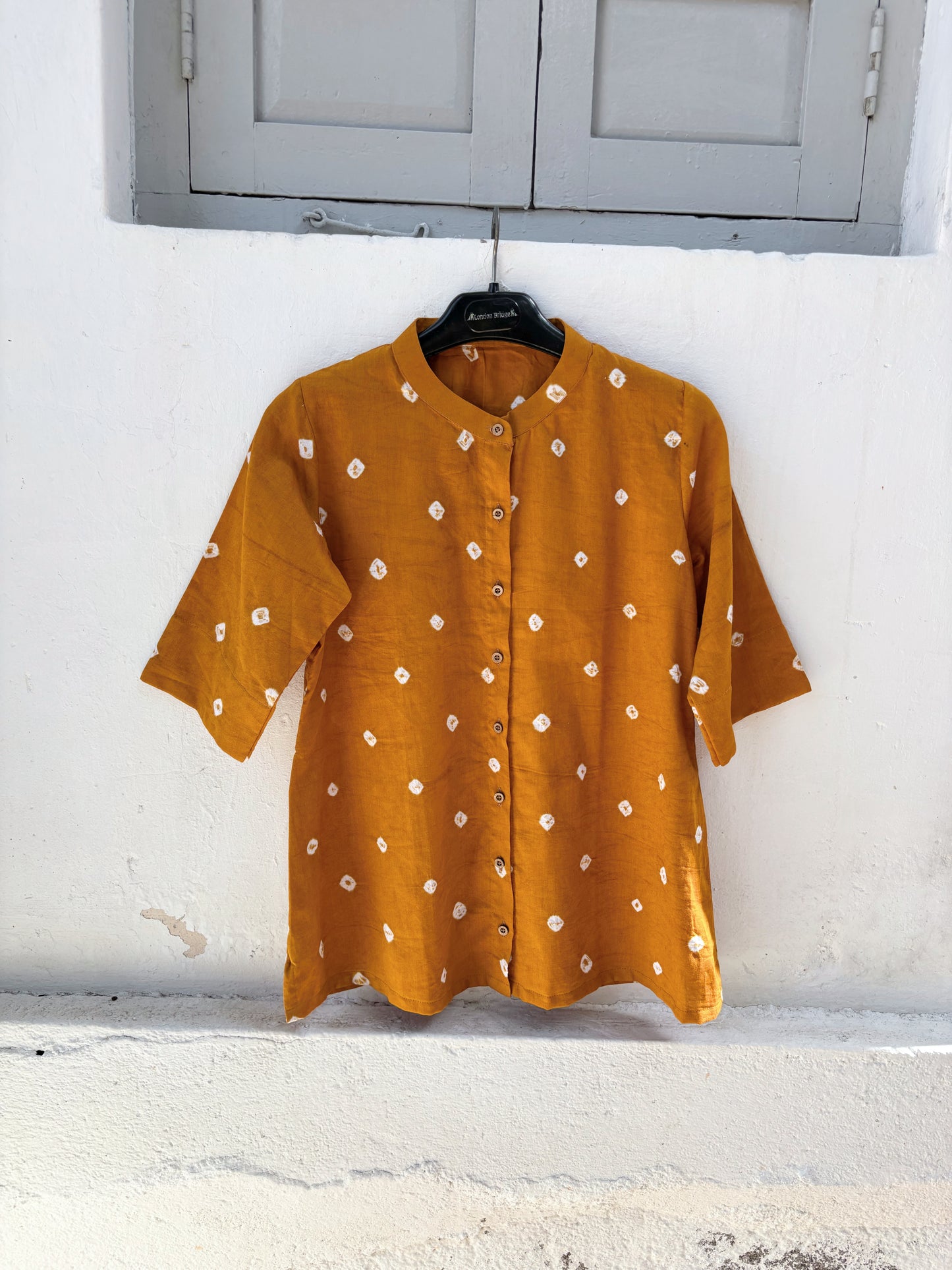Kasumbi Dani mustard Bandhani cotton satin relaxed fit shirt with mandarin collar for women