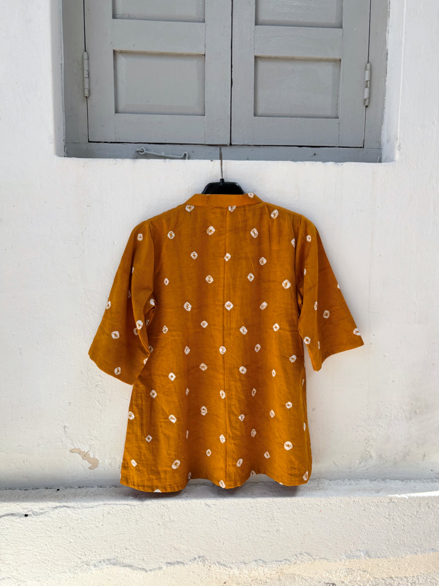 Kasumbi Dani mustard Bandhani cotton satin relaxed fit shirt with mandarin collar for women