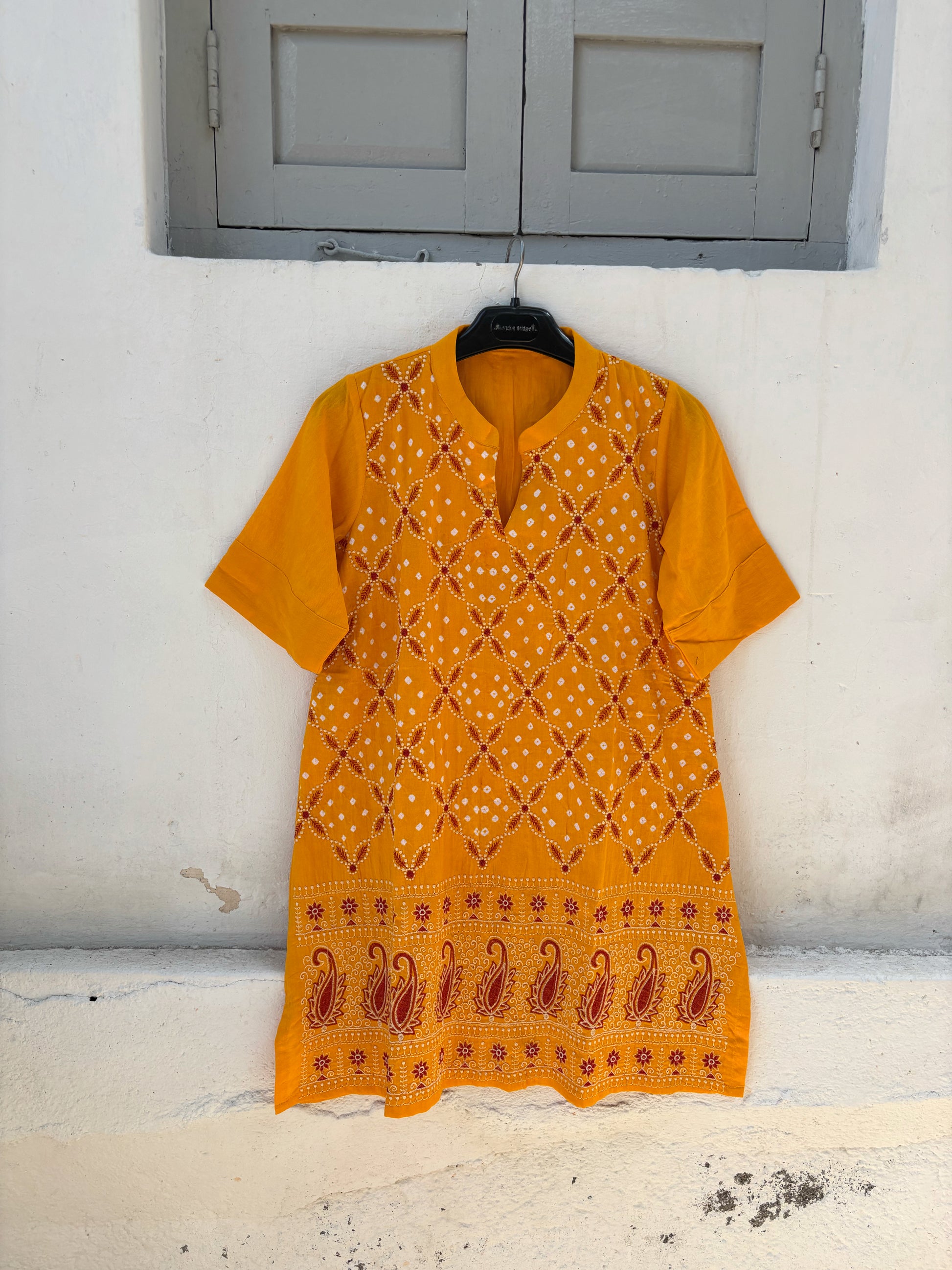 Yellow and maroon Bandhani three-piece set for women with embroidered kurta, comfortable-fit pants and hand tie dyed dupatta
