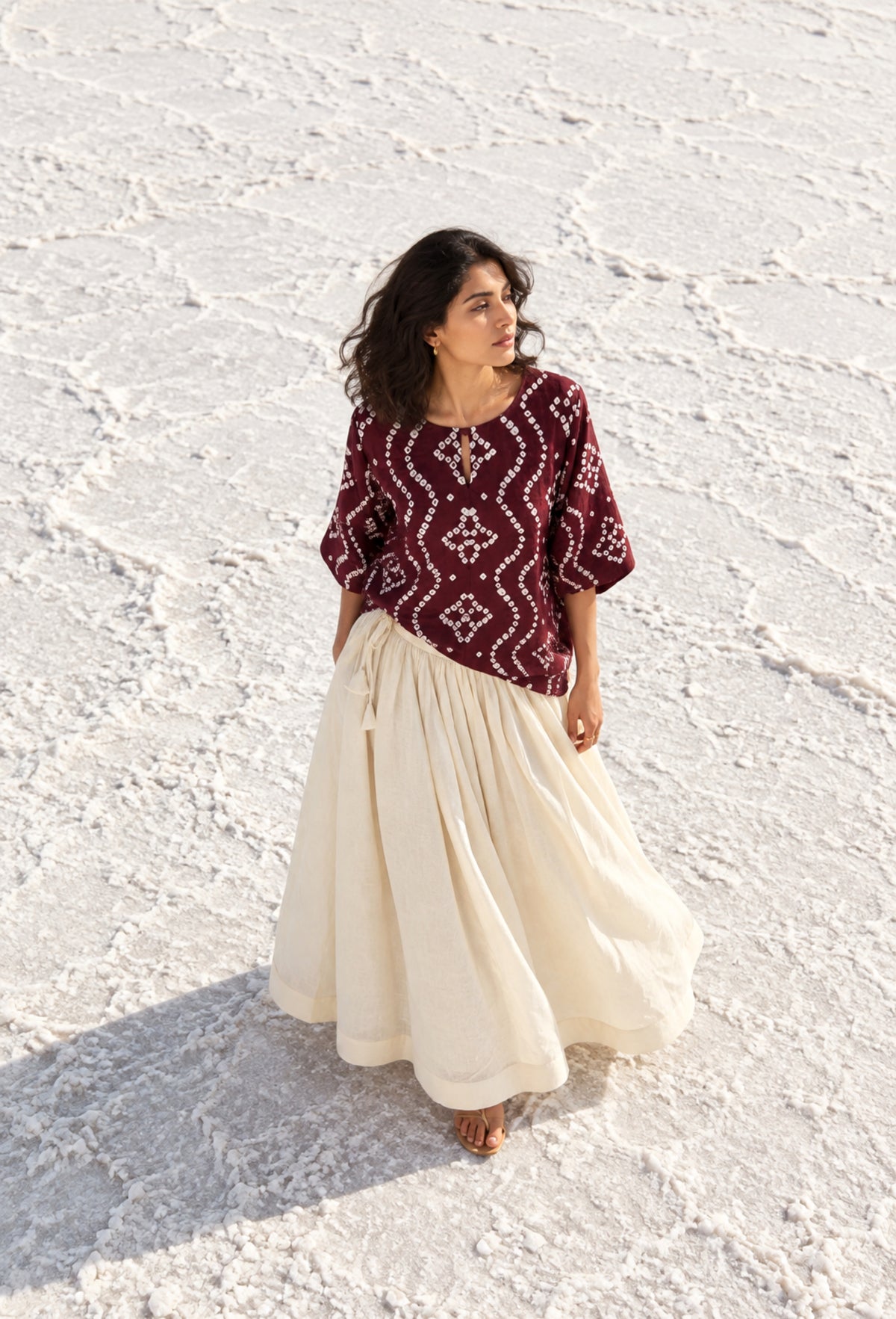 Madhur deep wine-plum cotton satin shirt with hand tie-dyed ivory Bandhani geometric patterns and round neckline.