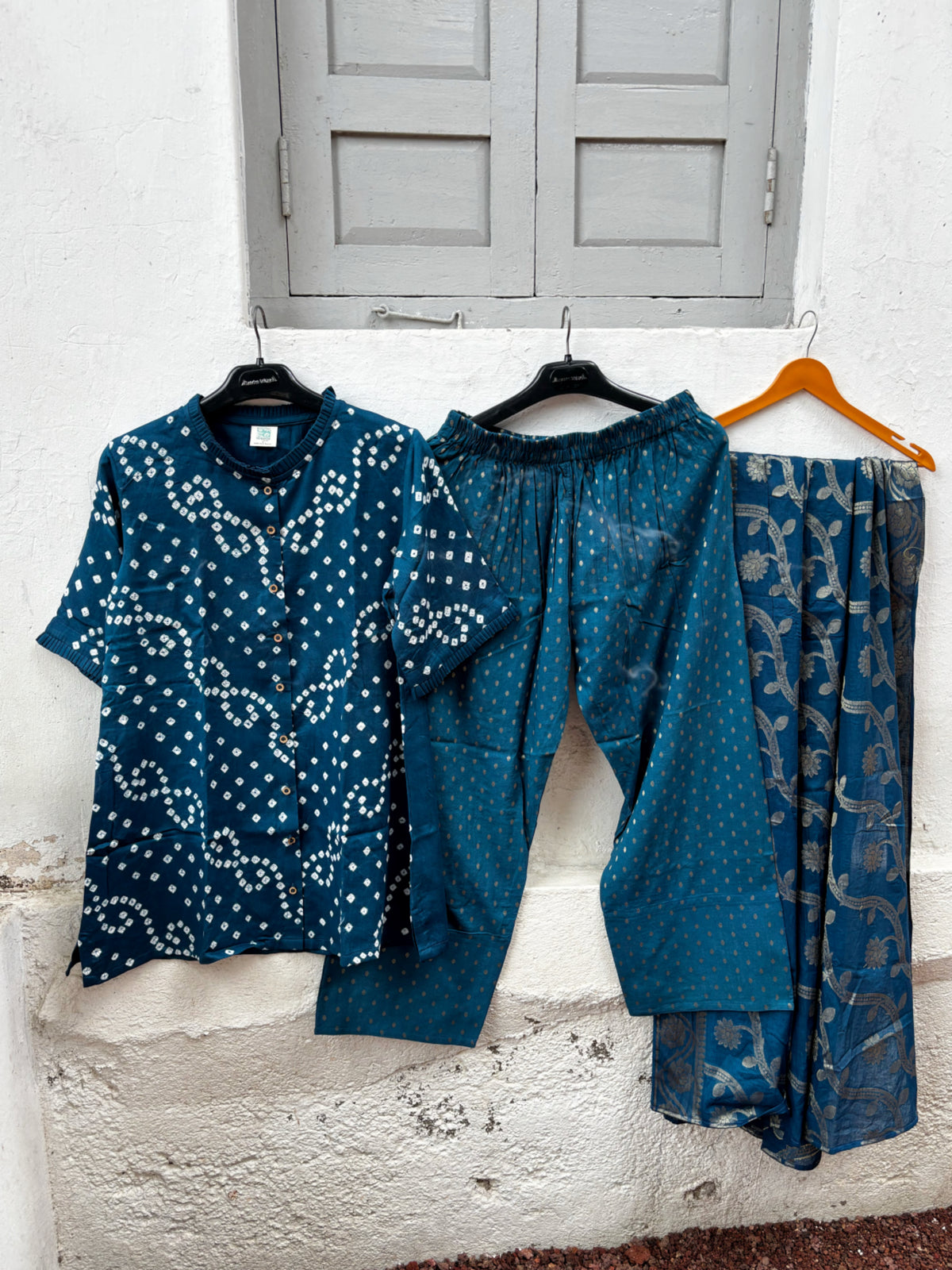 Megh deep teal-blue Bandhani shirt with pleated round neck, woven brocade Farshi pants with pockets and patterned dupatta