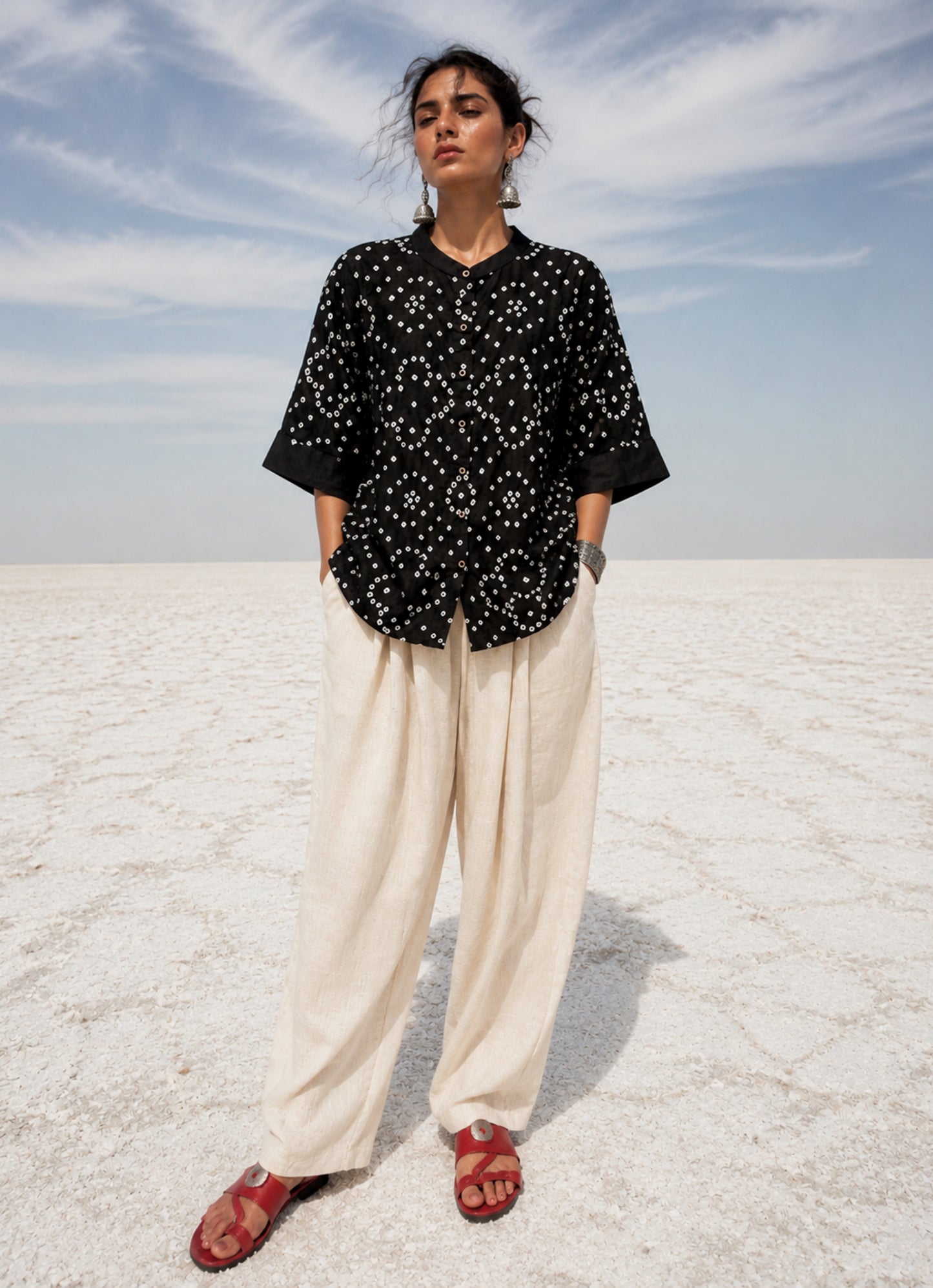 Kali black cotton satin Bandhani shirt with ivory white hand tie-dyed motifs, mandarin collar, folded sleeve cuffs and relaxed fit