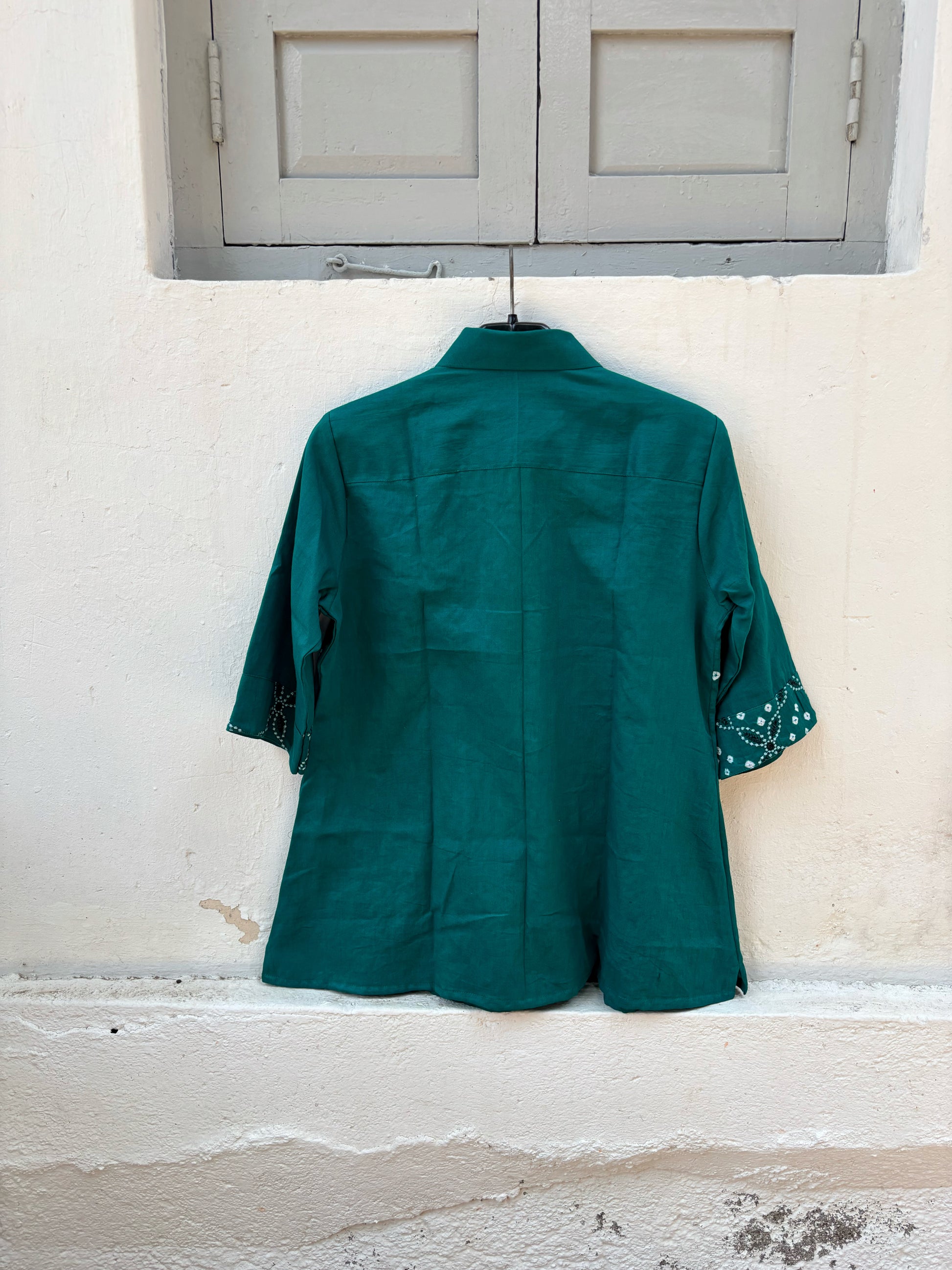 Peacock green Bandhani cotton satin shirt for women with hand tie-dyed detailing and embroidered border