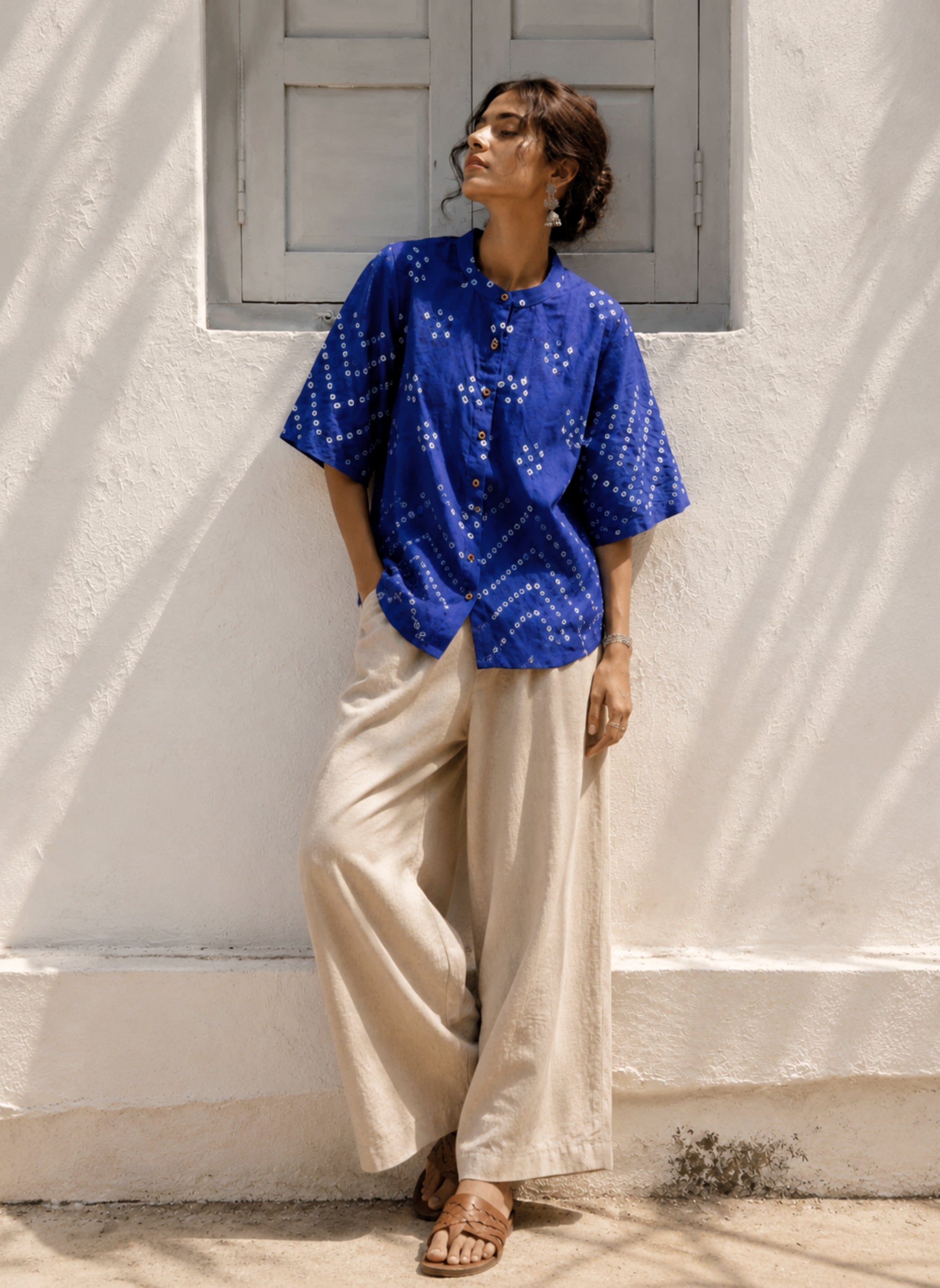 Neelam Dani royal blue handspun and handwoven organic cotton Bandhani shirt with soft mandarin collar, relaxed fit and handcrafted geometric motifs.