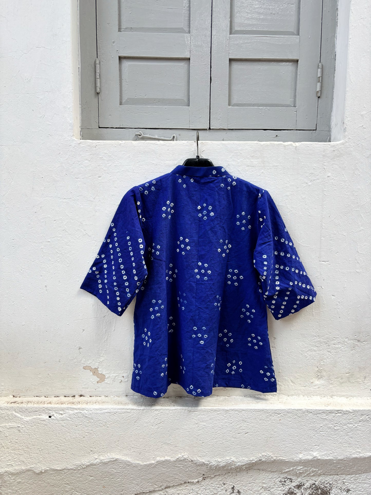 Neelam Dani royal blue handspun and handwoven organic cotton Bandhani shirt with soft mandarin collar, relaxed fit and handcrafted geometric motifs.