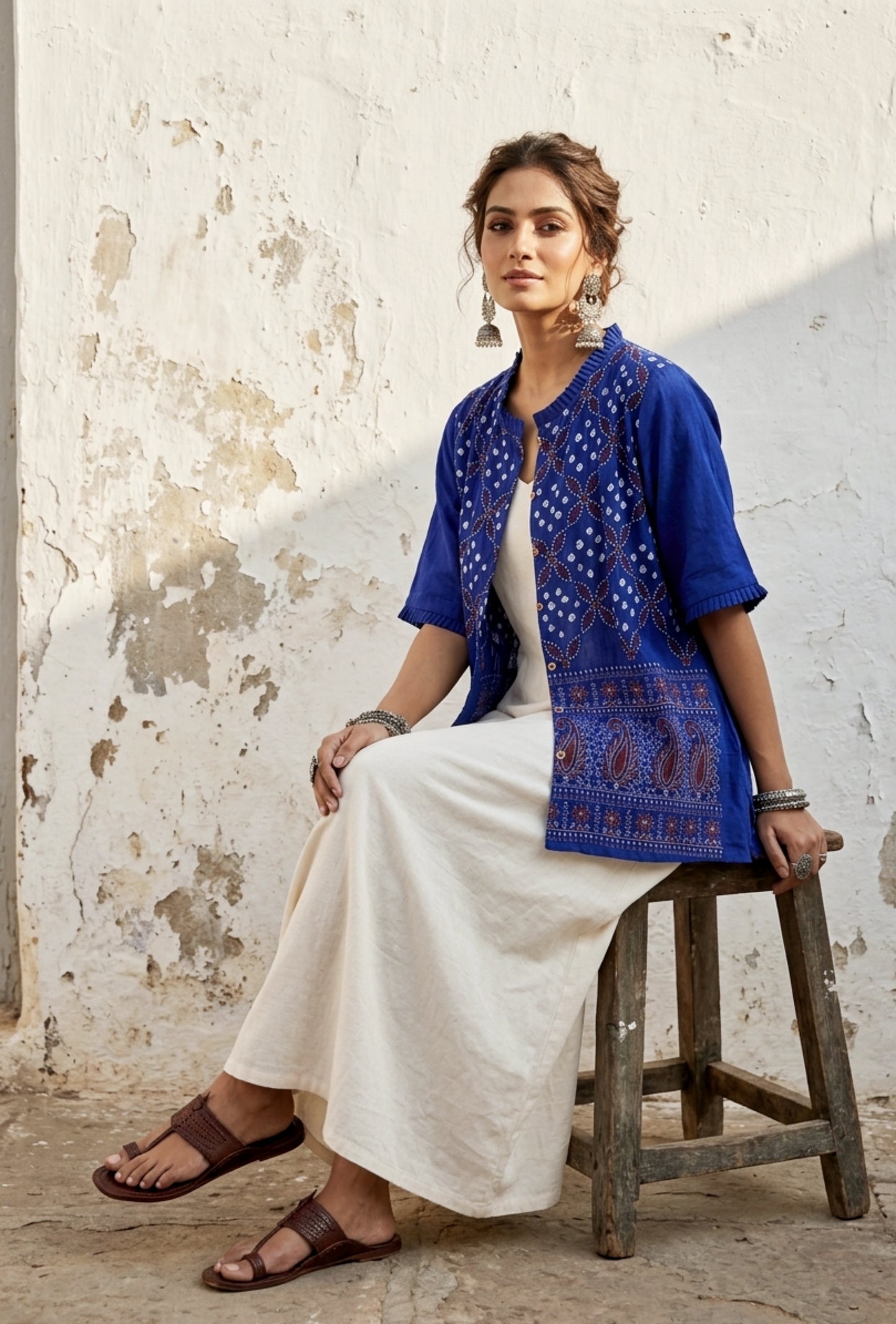 Neeli Dani blue Bandhani embroidered cotton satin relaxed fit shirt with pleated neckline for women