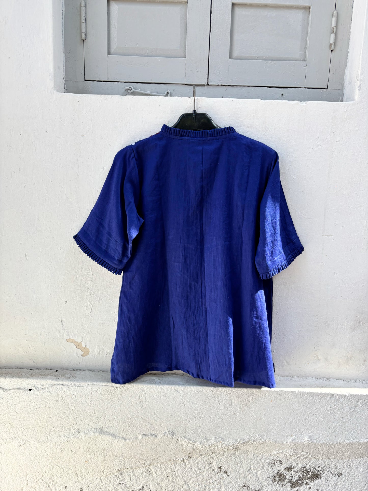 Neeli Dani blue Bandhani embroidered cotton satin relaxed fit shirt with pleated neckline for women