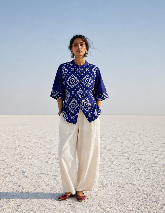 Neelva Dani royal blue hand tie dyed Bandhani cotton satin shirt with soft mandarin collar and relaxed fit for women.