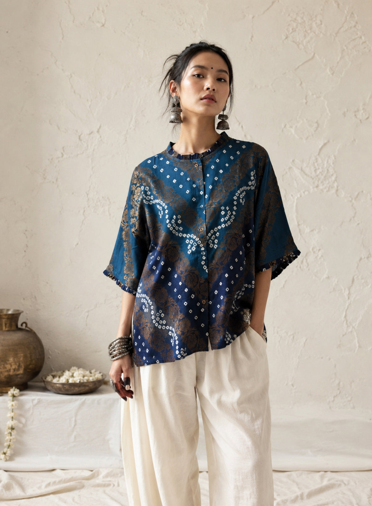 Neeravi festive Bandhani cotton shirt in two shades of teal with ivory hand tie-dyed Bandhani, antique-gold Banarasi floral weave and pleated neckline