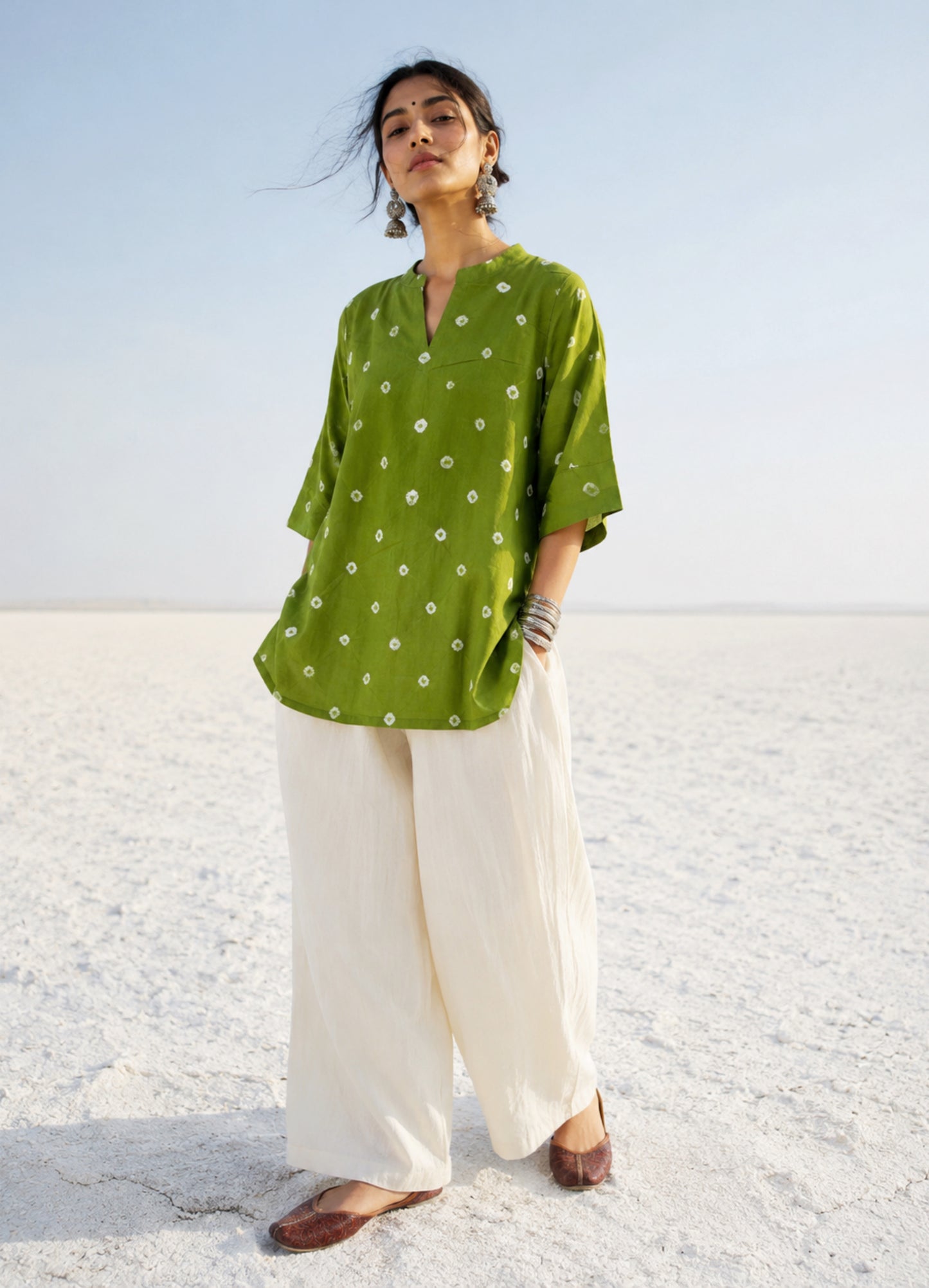 Olive green hand tie-dyed Bandhani cotton shirt with a soft mandarin collar.