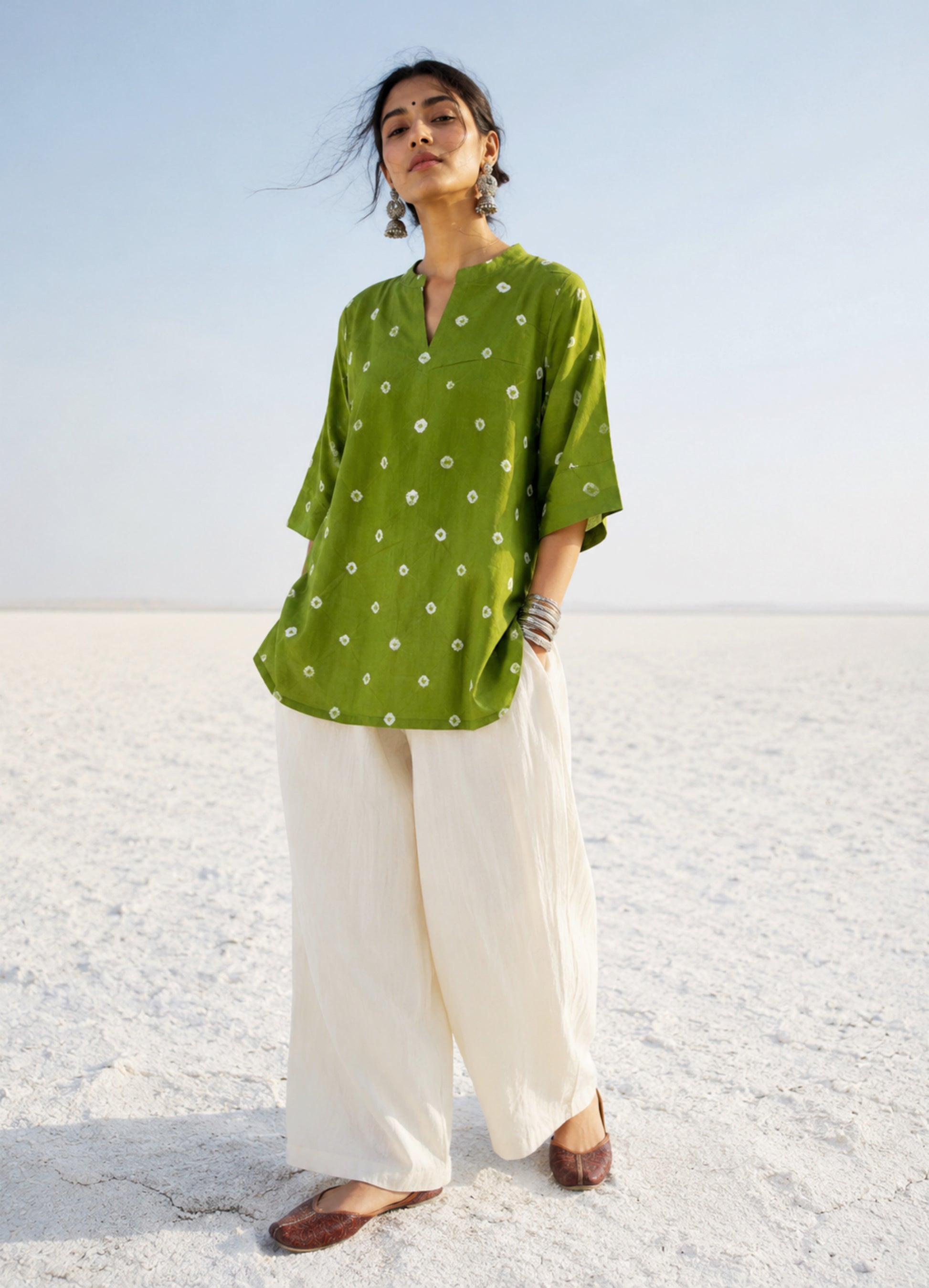 Olive green hand tie-dyed Bandhani cotton shirt with a soft mandarin collar.