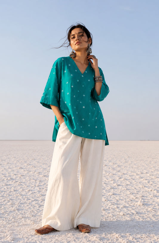 Women's peacock blue cotton Bandhani top with elbow-length sleeves.