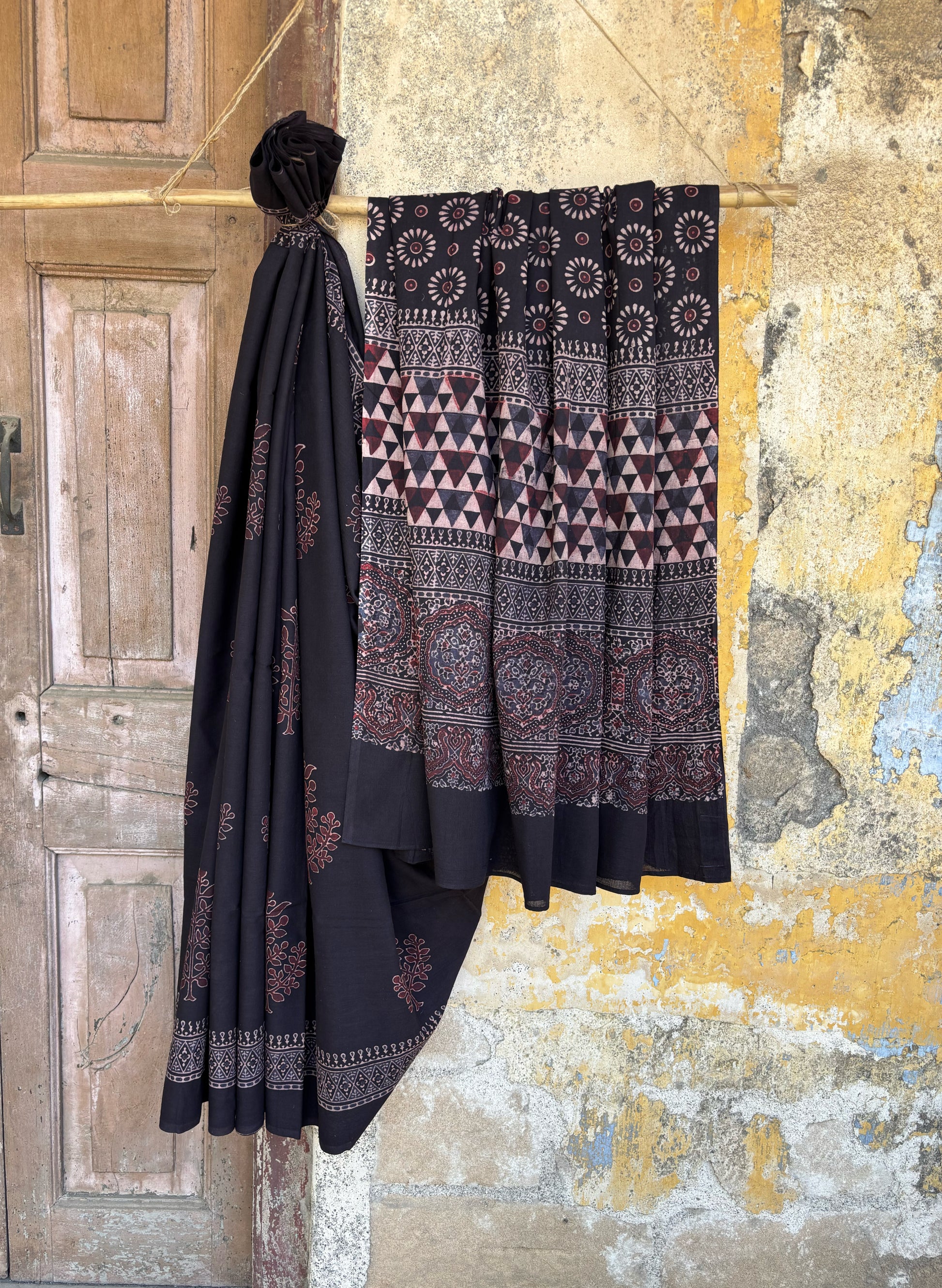 Raatrani Ajrakh hand block print natural dyed black cotton saree with maroon floral motifs and geometric pallu -Turquoisethestore