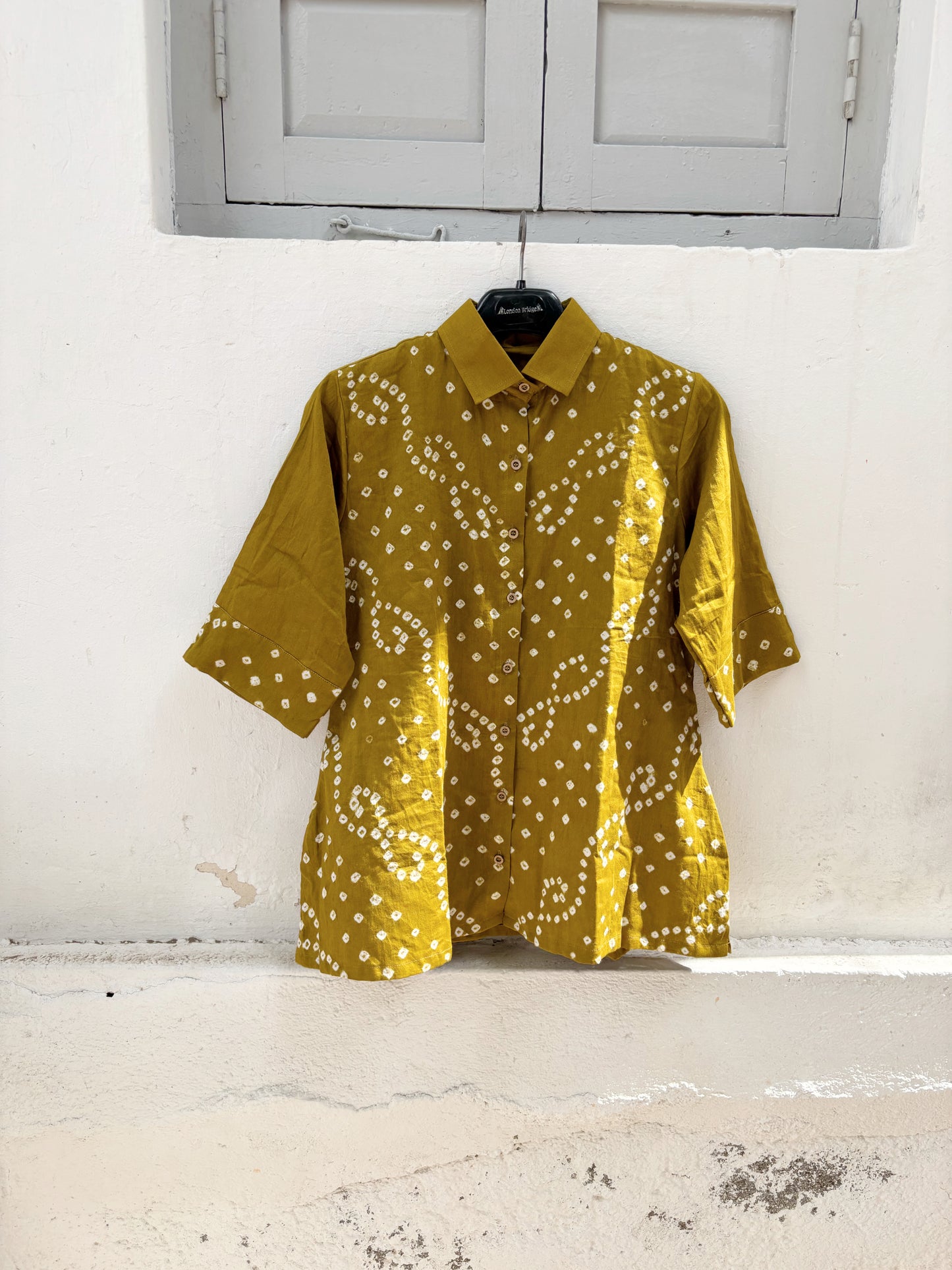 Rai Dani mustard hand tie dyed Bandhani cotton satin shirt with classic collar and relaxed fit for women