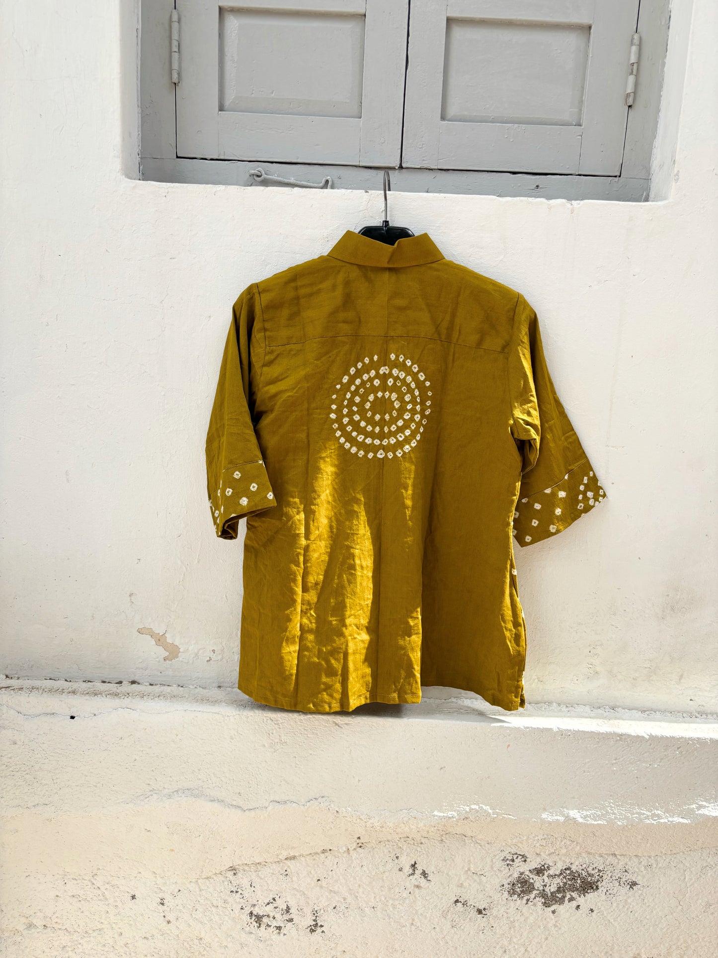 Rai Dani mustard hand tie dyed Bandhani cotton satin shirt with classic collar and relaxed fit for women