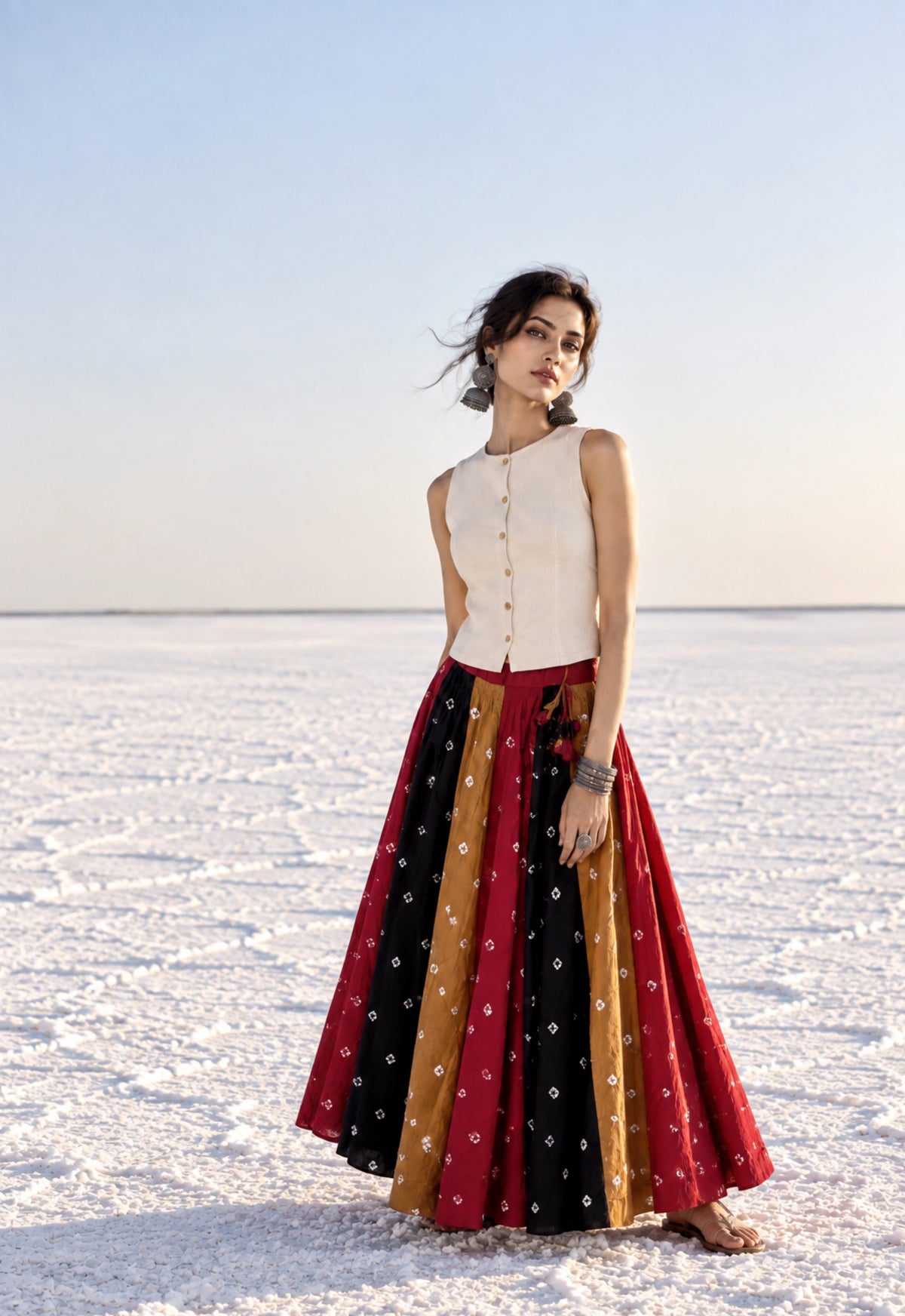 Rangotsav multicolour hand tie-dyed Bandhani cotton skirt with red, black and mustard panels and ivory motifs