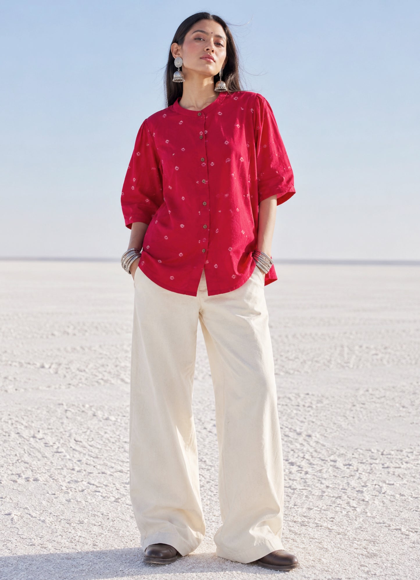 Relaxed fit raspberry pink Bandhani cotton shirt with wooden buttons.
