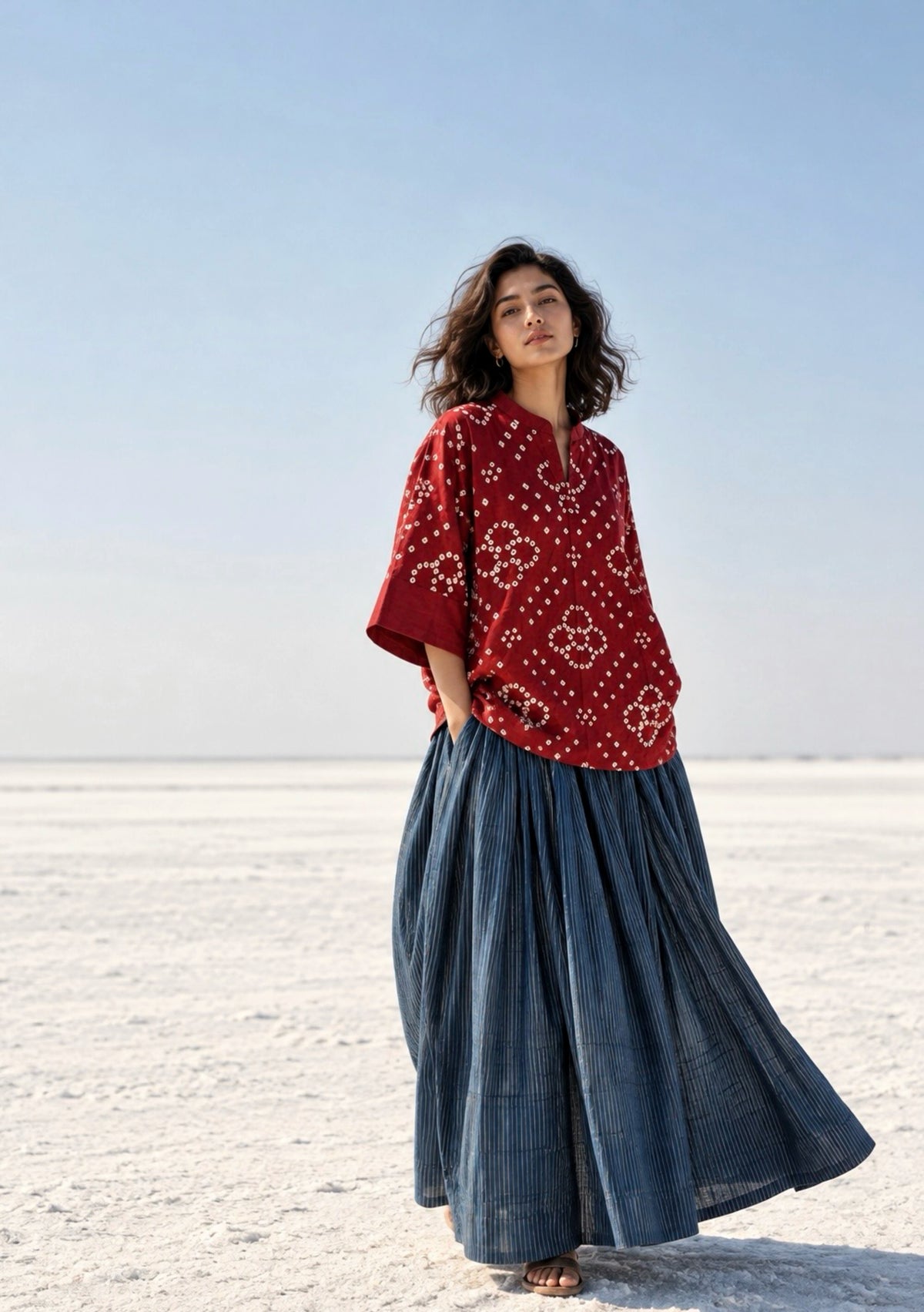 Sangria deep wine-red cotton satin top with ivory-beige hand tie-dyed Bandhani motifs and a soft mandarin collar with V-slit front.