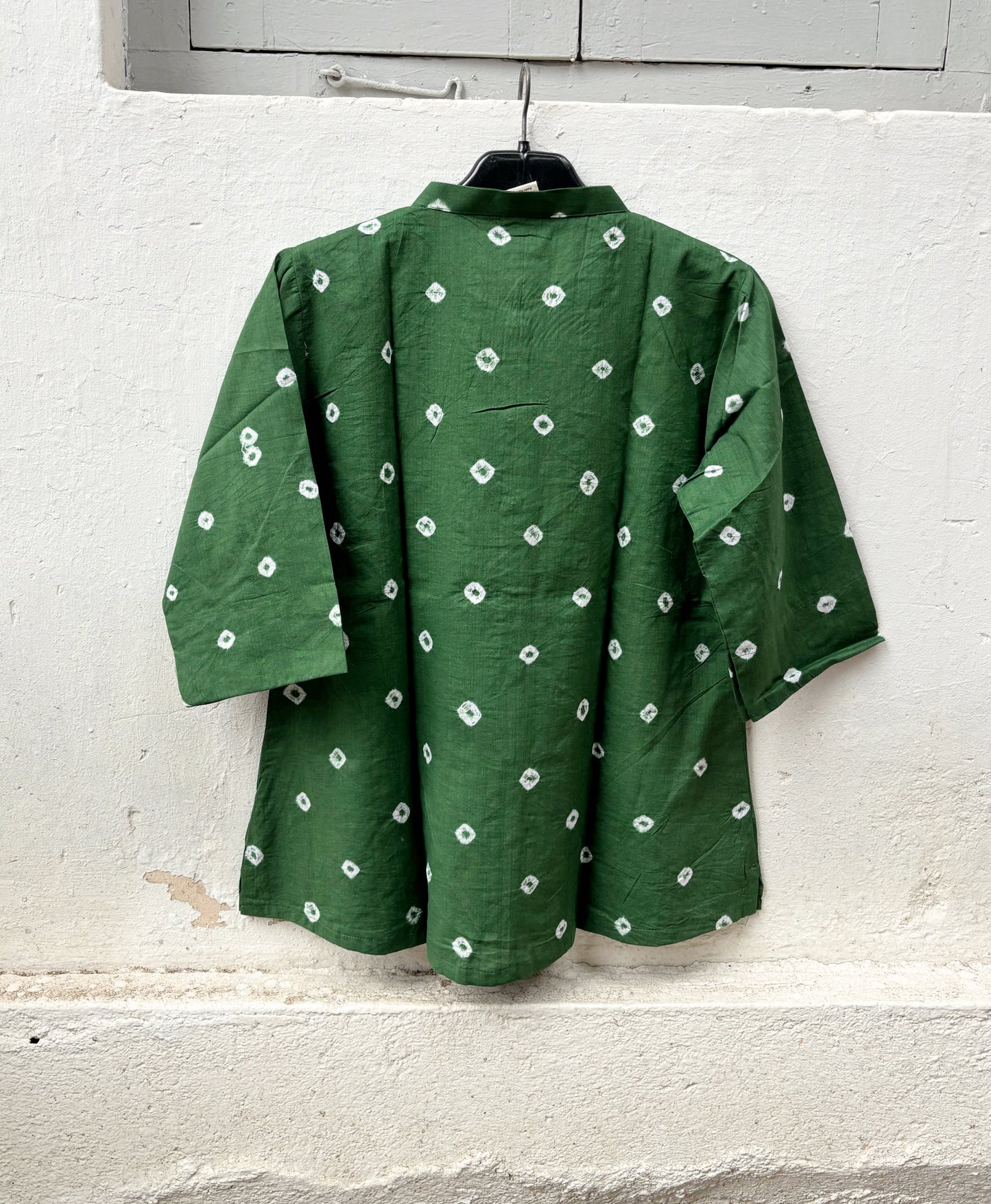 Women's moss green cotton Bandhani shirt featuring a soft mandarin collar.