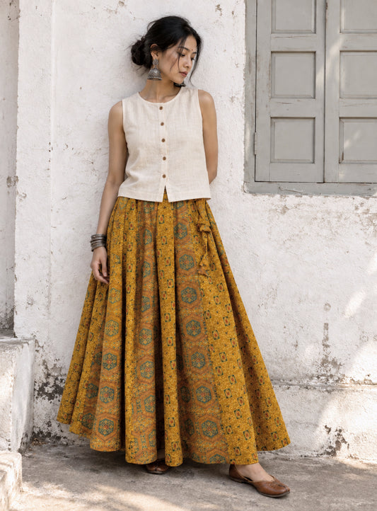 Sonajhuri turmeric-dyed Ajrakh cotton kali-cut skirt with hand block print