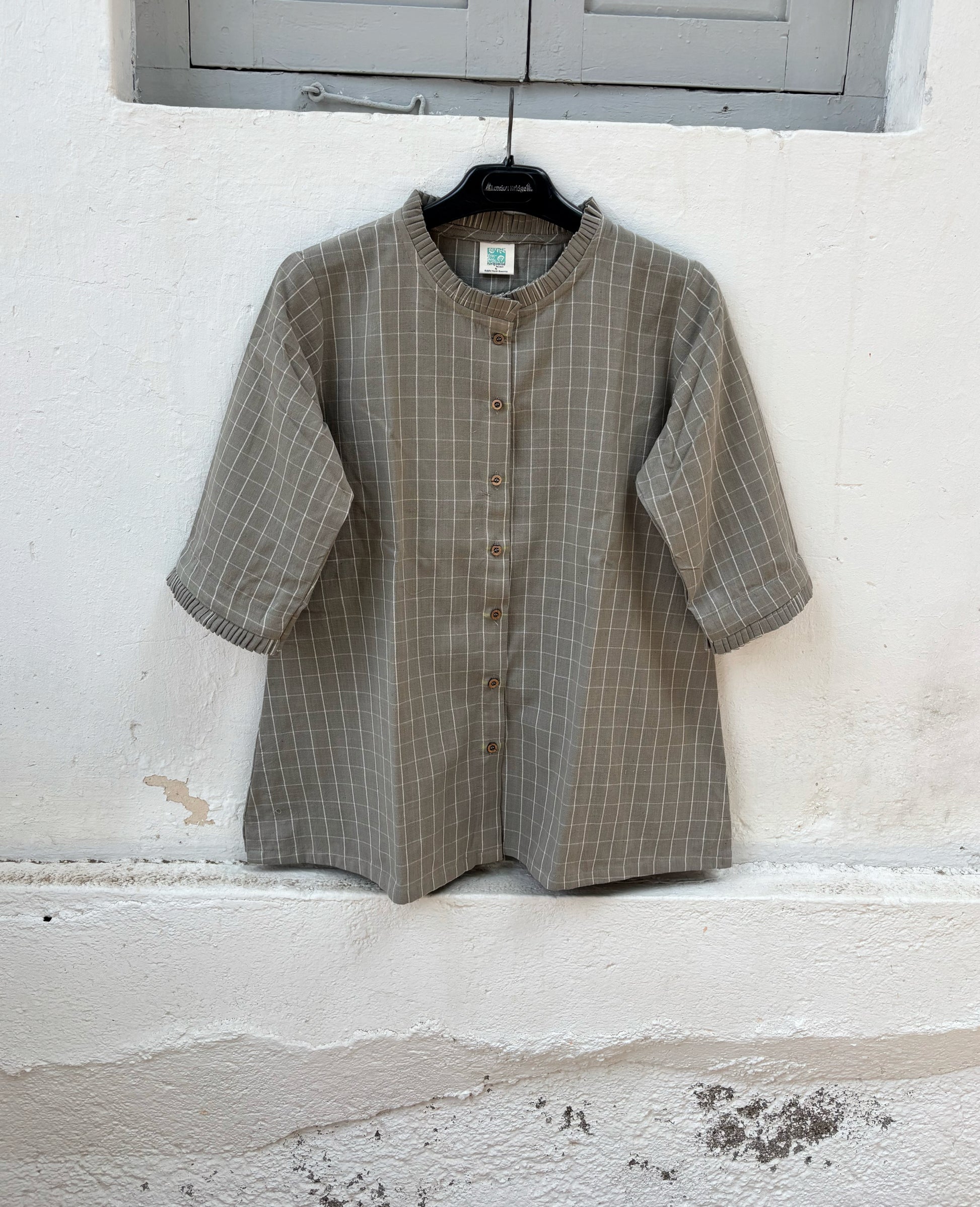 Stone grey hand spun handwoven cotton checks shirt with pleated neckline, pleated sleeve hems and relaxed fit