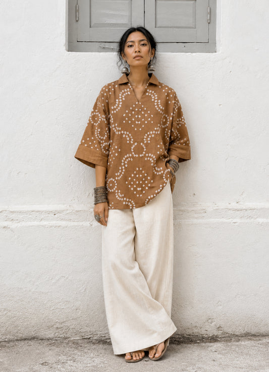 Toffee Brown Cotton Satin Bandhani Shirt with geometric hand tie-dyed motifs, open notch collar, V-neckline, relaxed fit, and elbow-length sleeves.