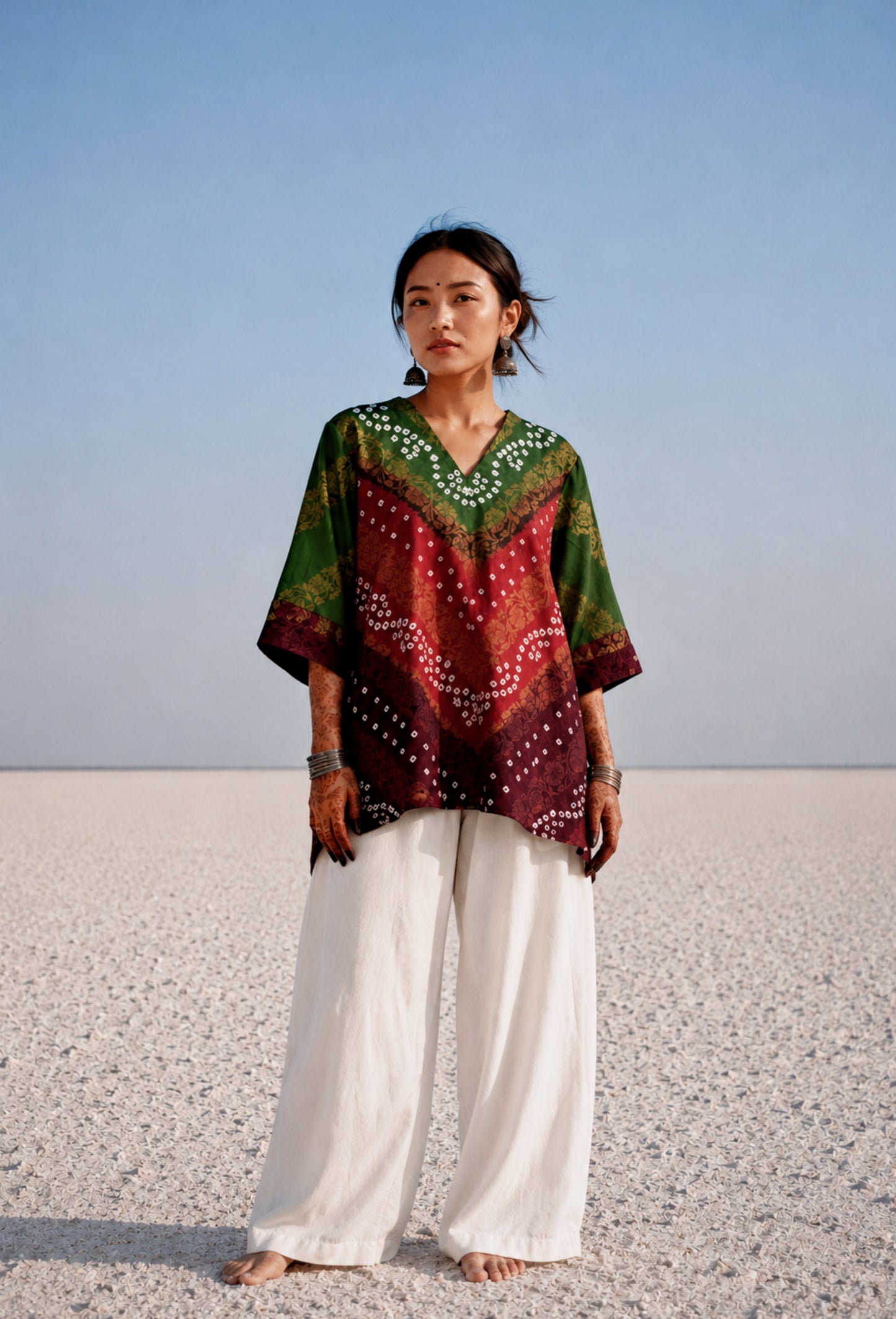 Handcrafted Bandhani festive cotton top in Forest Green, Rust Ochre and Wine Maroon with antique gold woven floral motifs, V-neck, relaxed fit and three-quarter sleeves.